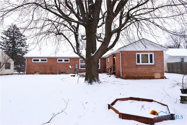 view of snow covered property