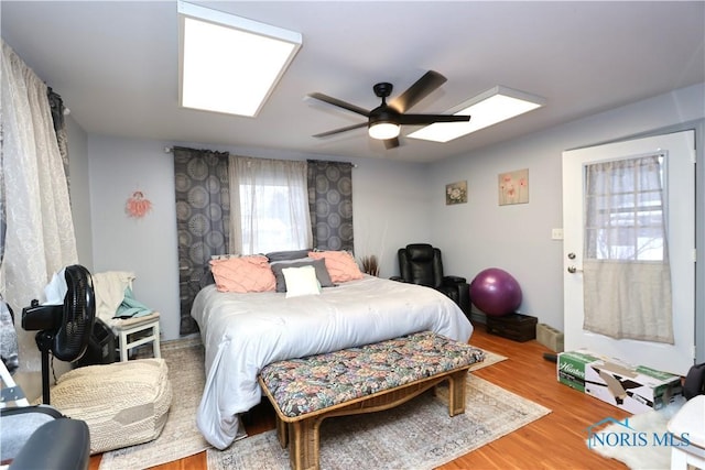 bedroom featuring ceiling fan and wood-type flooring