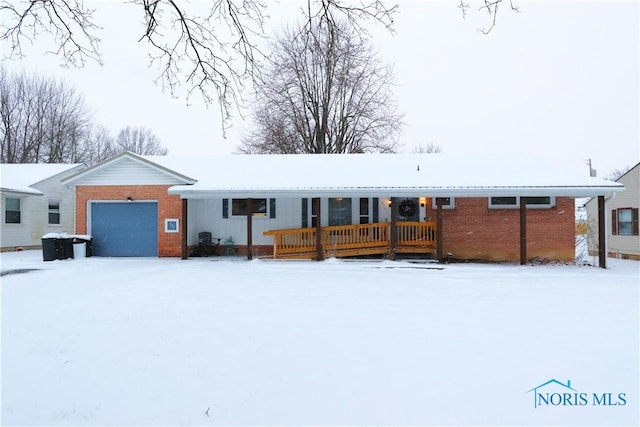 ranch-style house featuring a garage