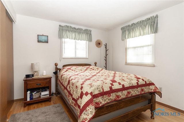 bedroom featuring hardwood / wood-style flooring