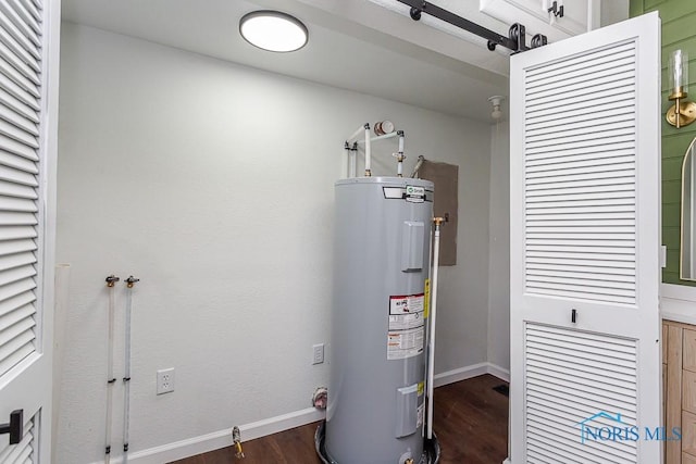 utility room with electric water heater