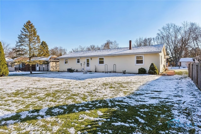 view of snow covered property