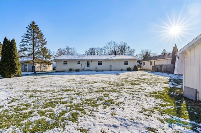 view of snow covered property