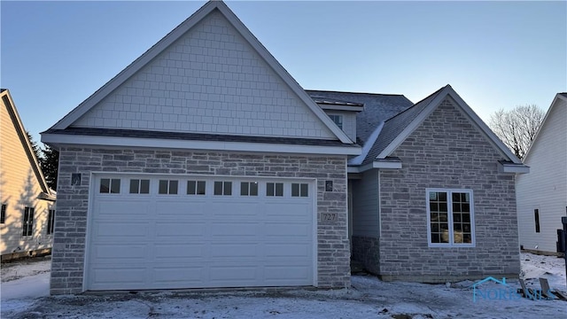 view of front of home with a garage