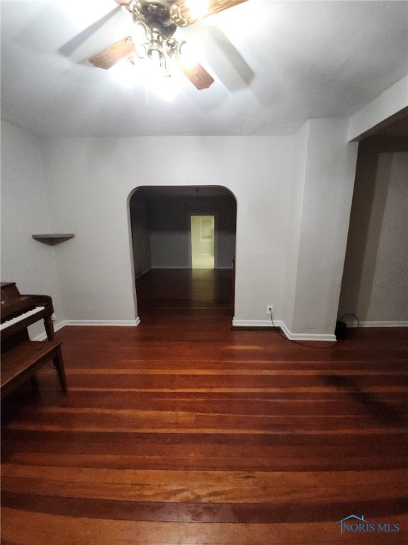 interior space with hardwood / wood-style flooring and ceiling fan