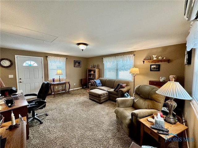 living room with carpet flooring and an AC wall unit