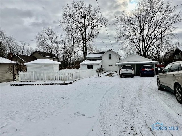 view of yard layered in snow