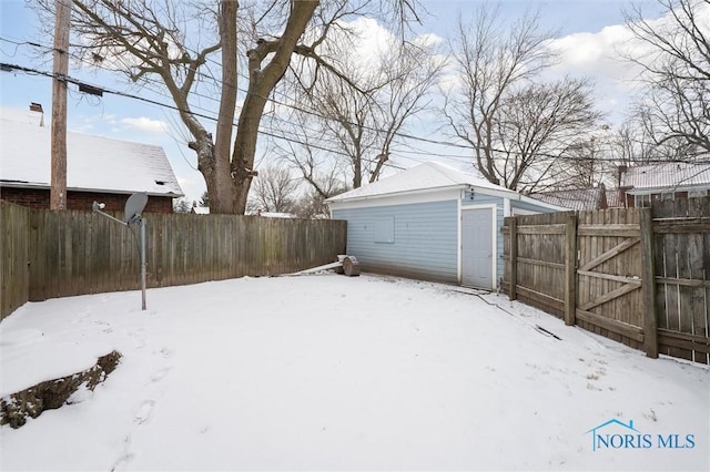 view of yard covered in snow