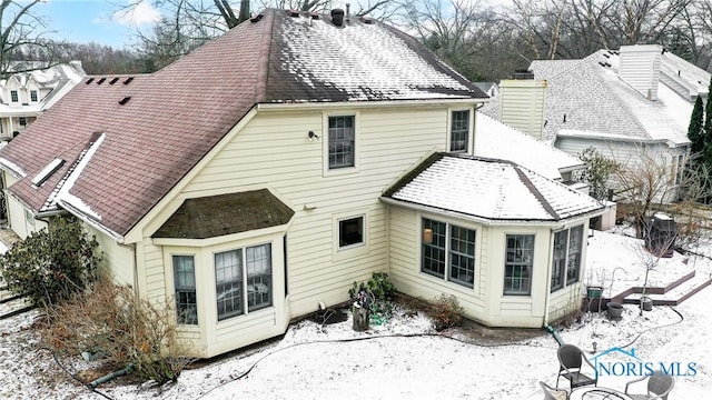 view of snow covered property