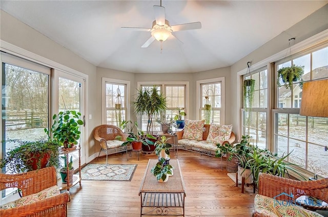 sunroom / solarium with ceiling fan