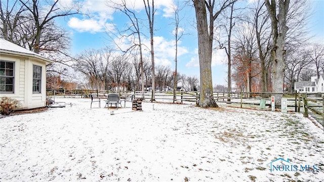 view of snowy yard