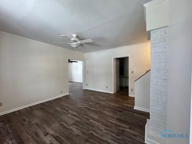 unfurnished living room featuring ceiling fan and dark hardwood / wood-style flooring