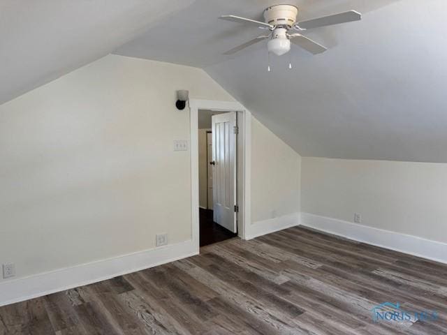 bonus room with dark wood-type flooring, ceiling fan, and lofted ceiling