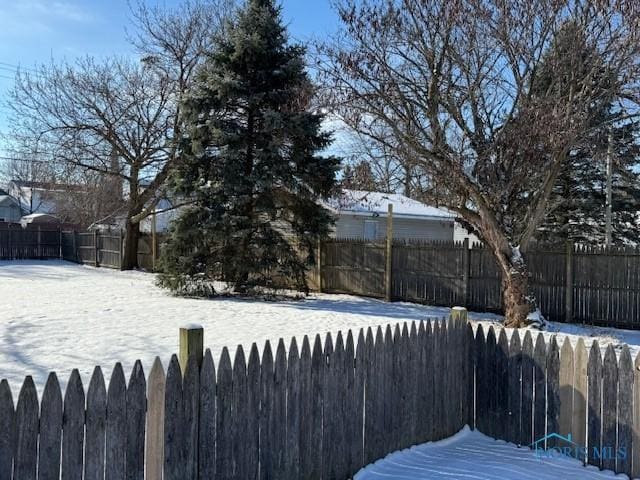 view of snowy yard