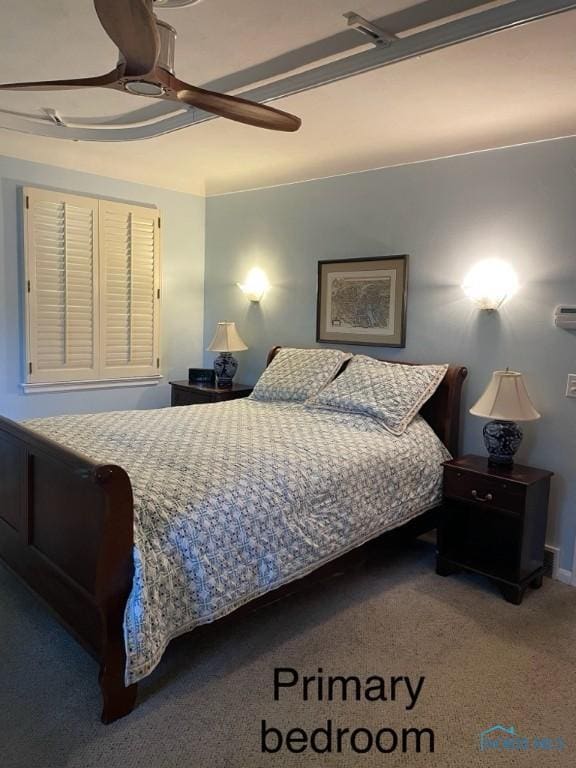 bedroom featuring ceiling fan and carpet floors