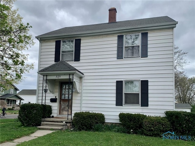 view of front of house featuring a front yard