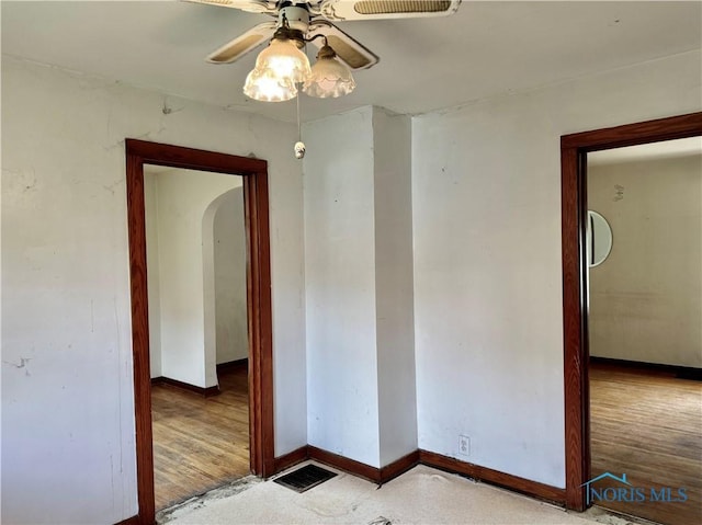 spare room with ceiling fan