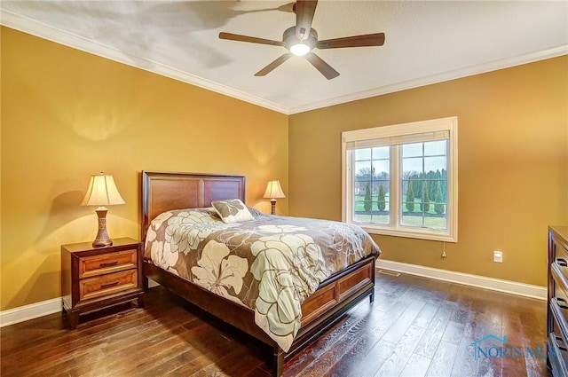 bedroom with ceiling fan, ornamental molding, and dark wood-type flooring