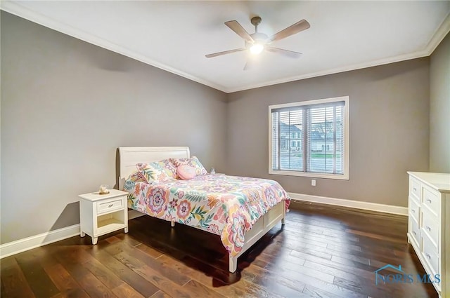 bedroom featuring ceiling fan, crown molding, and dark hardwood / wood-style floors