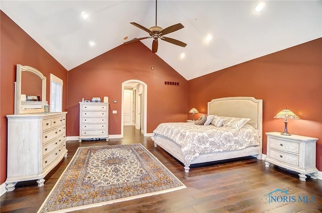 bedroom featuring ceiling fan, high vaulted ceiling, and dark wood-type flooring