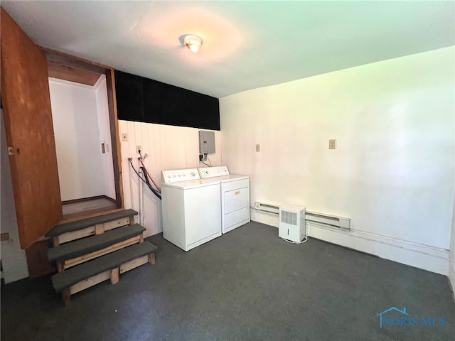 washroom featuring a baseboard radiator and independent washer and dryer