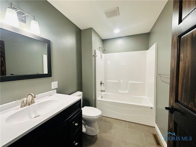 full bathroom featuring shower / bathing tub combination, vanity, toilet, and tile patterned floors