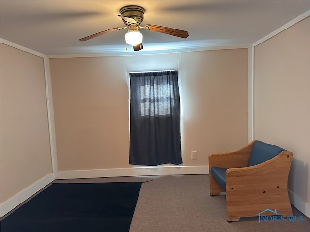 unfurnished room with carpet floors, ceiling fan, and ornamental molding