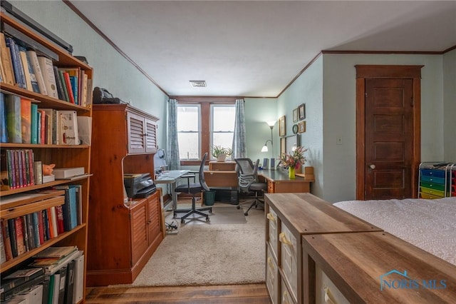 office space with crown molding