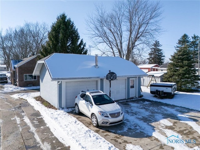 exterior space featuring a garage