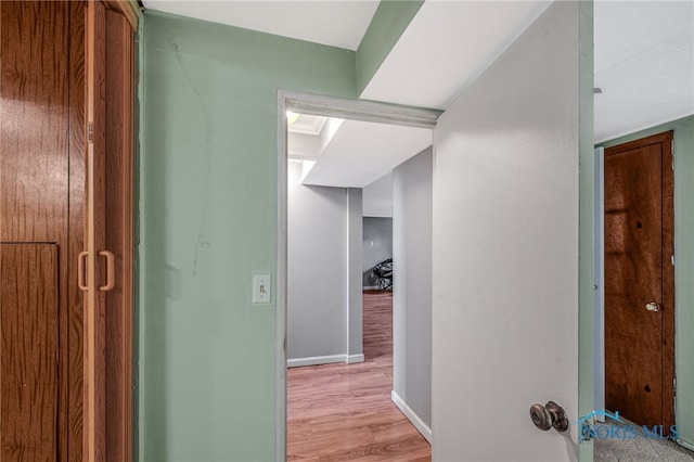 hall featuring light hardwood / wood-style flooring