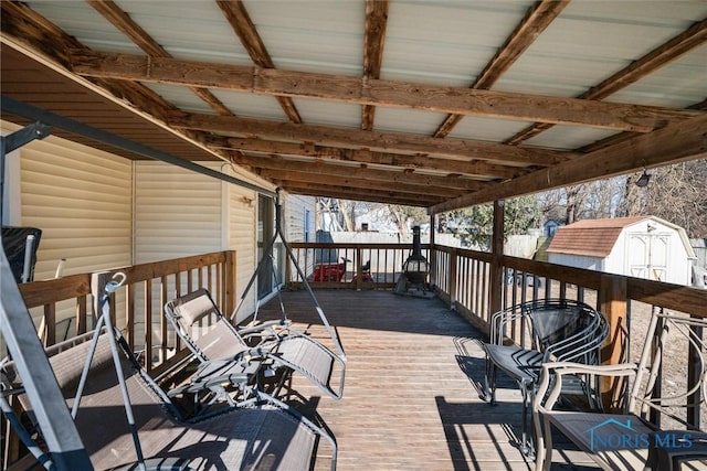 deck featuring a storage shed