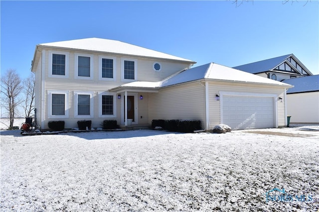 view of front of property featuring a garage