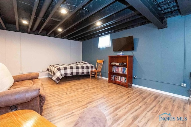 bedroom featuring wood-type flooring