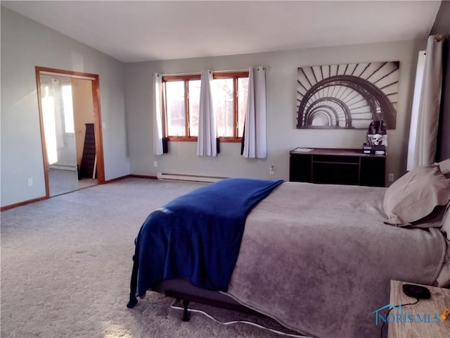 bedroom featuring carpet floors and baseboard heating