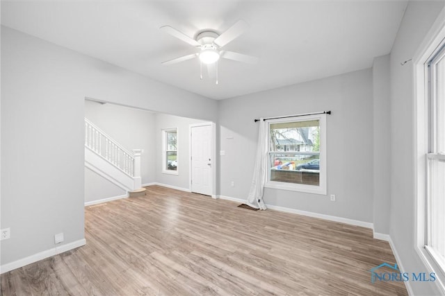 interior space featuring ceiling fan and light hardwood / wood-style floors