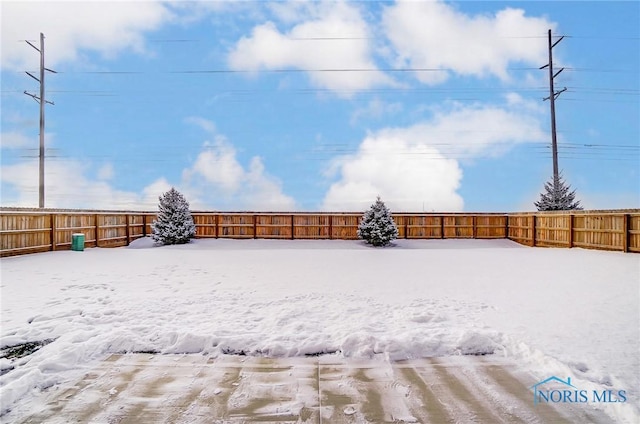 view of snowy yard