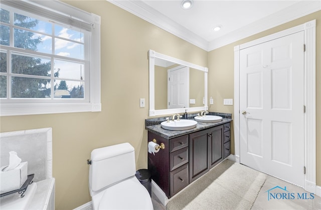 bathroom featuring toilet, vanity, tile patterned floors, and crown molding