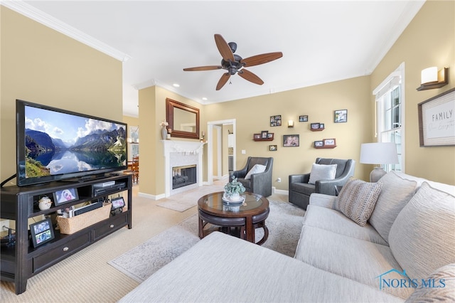 living room with crown molding, ceiling fan, and light colored carpet