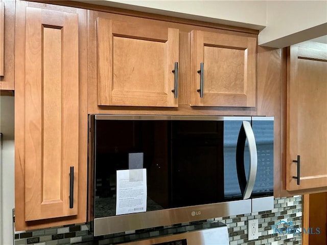 interior details featuring decorative backsplash