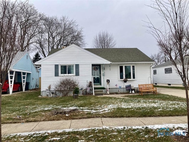 view of front of home featuring a front yard