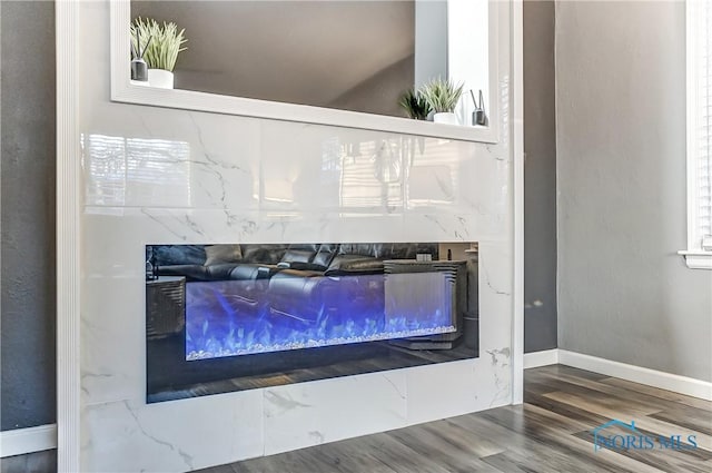 interior details with hardwood / wood-style flooring