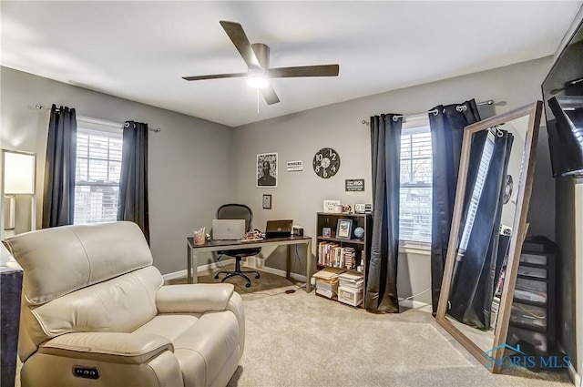 carpeted office with ceiling fan