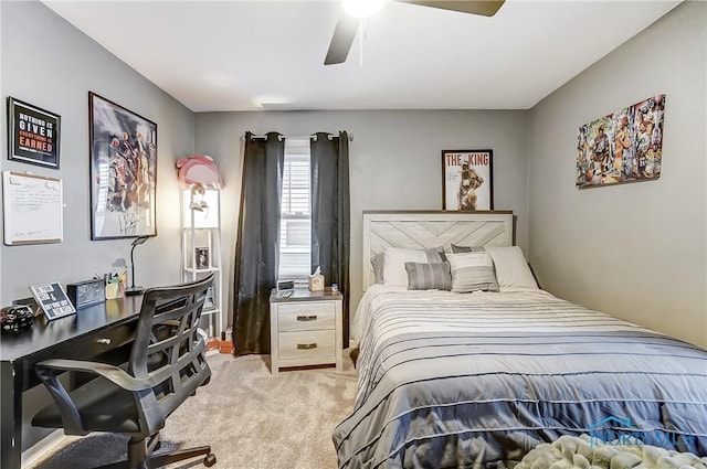 bedroom featuring light carpet and ceiling fan