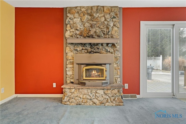 unfurnished living room featuring carpet flooring