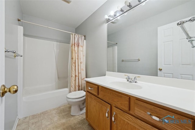 full bathroom featuring shower / tub combo, vanity, and toilet