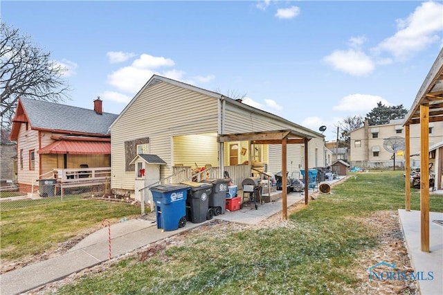 view of property exterior with a lawn