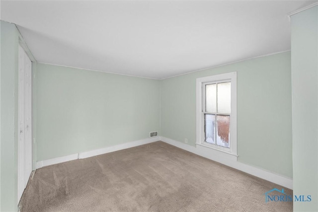 view of carpeted spare room