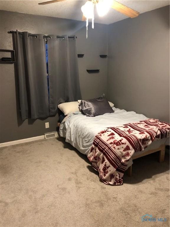 bedroom featuring carpet flooring and ceiling fan