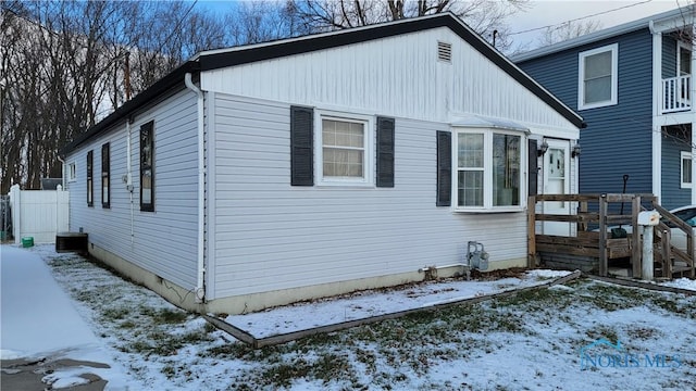 view of snow covered property