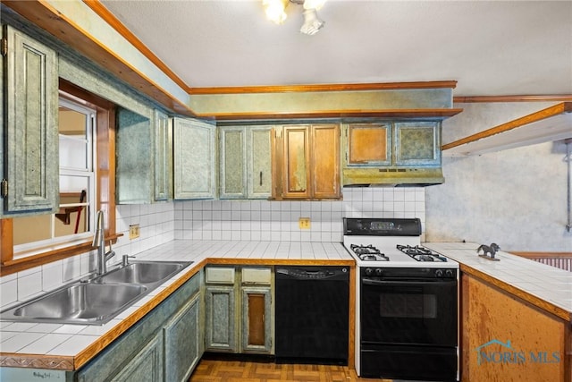 kitchen with tile countertops, gas range, dishwasher, and sink